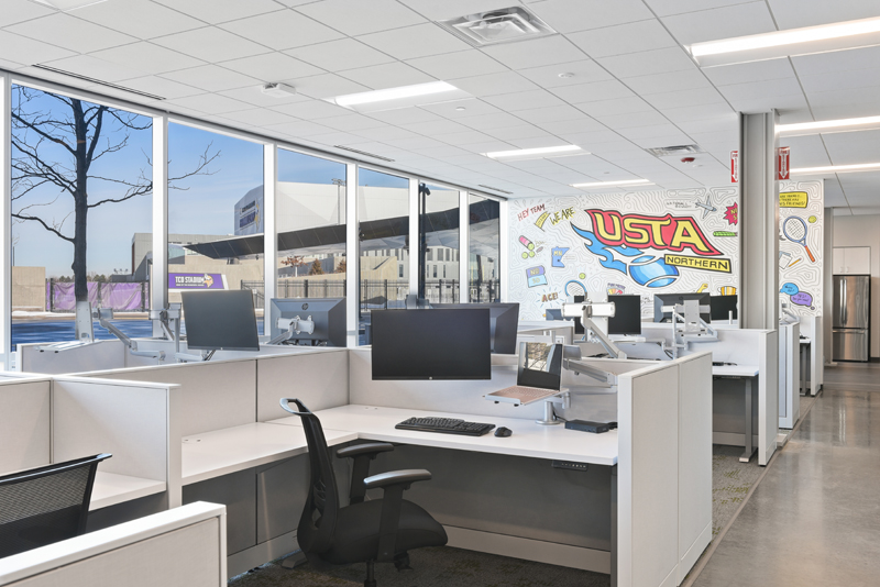 USTA Northern wall graphic and workstations