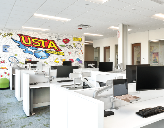 USTA Northern wall graphic and workstations